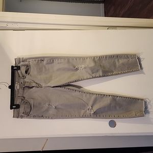 Distressed grey denim jeans. Mid rise ankle length. Siz 13 but fits like a 10
